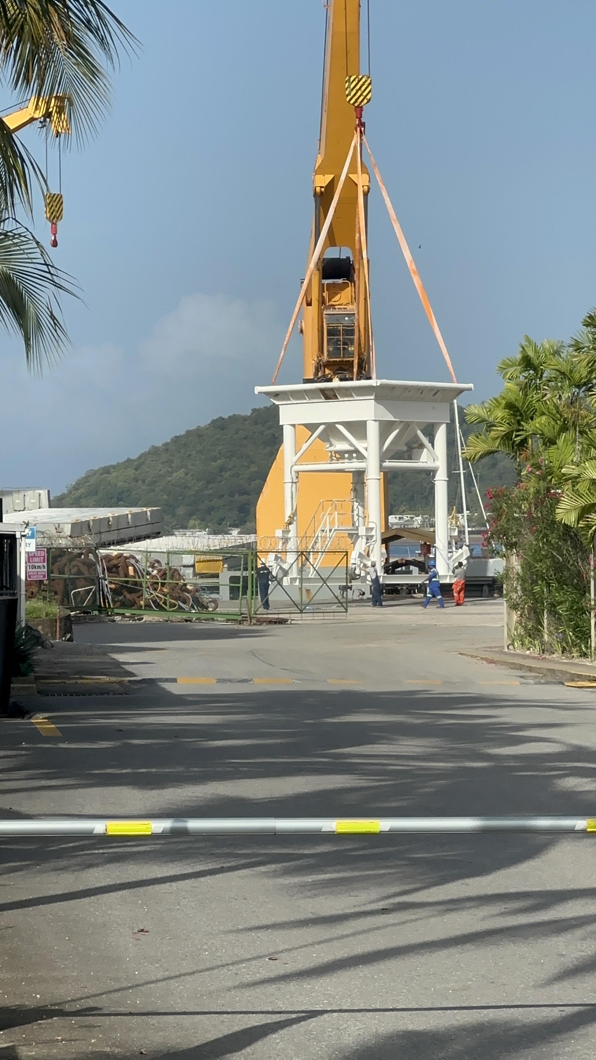 Preparing to discharge sand from Curaçao's Mijnmaatschappij in Trinidad for the production of glass.